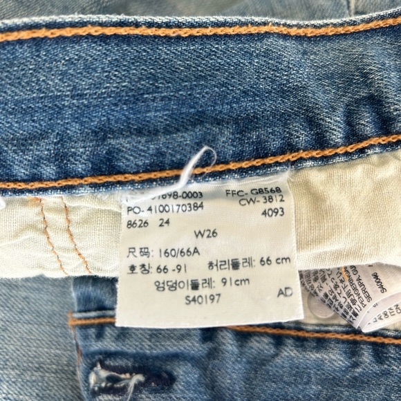 Levi's denim cut-off shorts with unique orange and teal pocket pattern - Picture 3 of 5